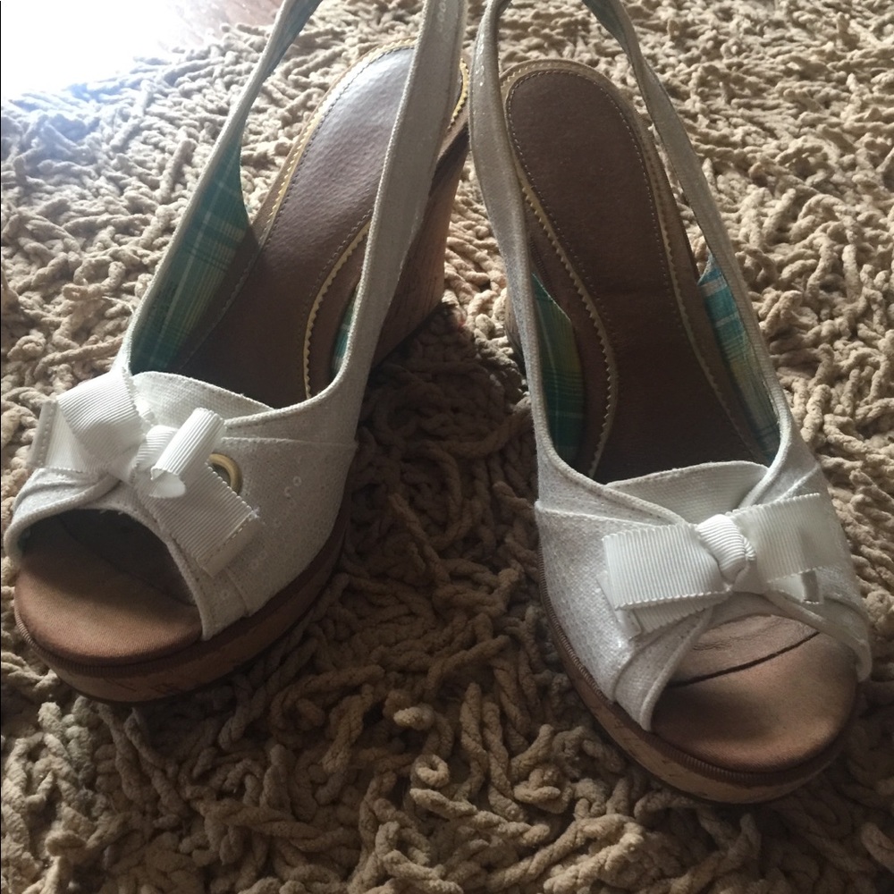 Sperry Top Sider. White size 10 M with a 4” Heel